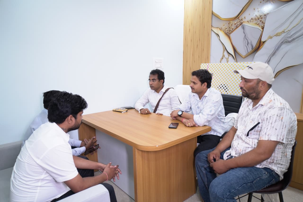 Doctor consulting with patient and parents